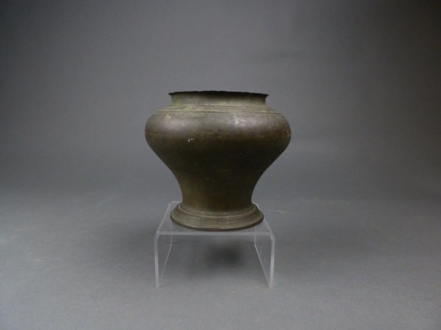 Continental bronze jar: - flared body with horizontal texture near mouth and at base; late 17th/early 18th Century. Height: 5 in. Diameter: 6 in.
