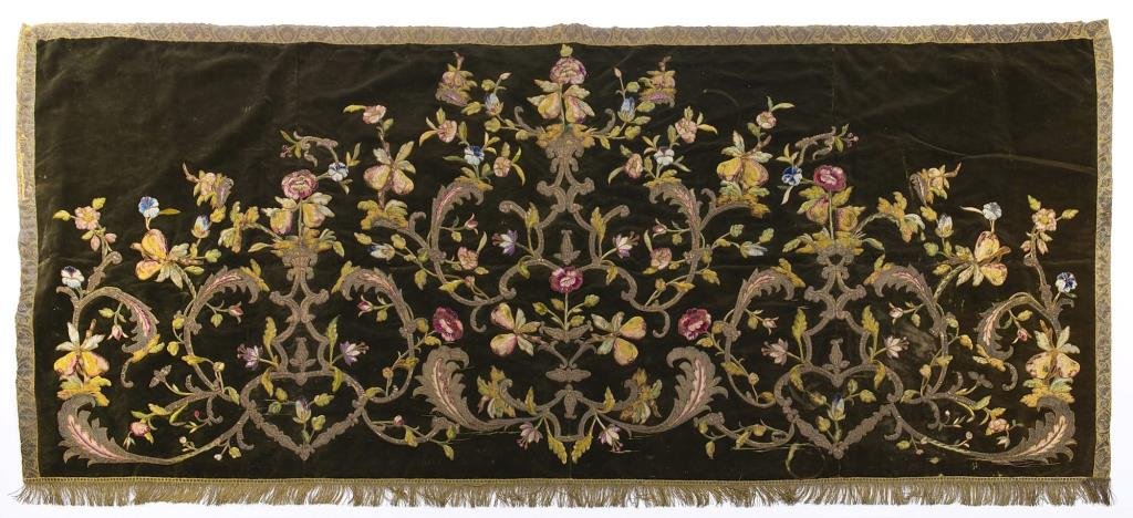 AN EARLY ITALIAN VELVET NEEDLEWORK TEXTILE: Green velvet embroidered with polychrome silk pear trees and blossoms and metallic threading, 18th century or earlier, possibly part of an alter panel. 230 x 99 cm (90 1/2 x 39 in.)
