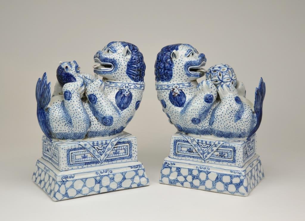 Pair Of Chinese Blue And White Porcelain Fu Dog: H. 24cm (9.5 in.) In good condition with no chip or crack. Very minor firing flaws.