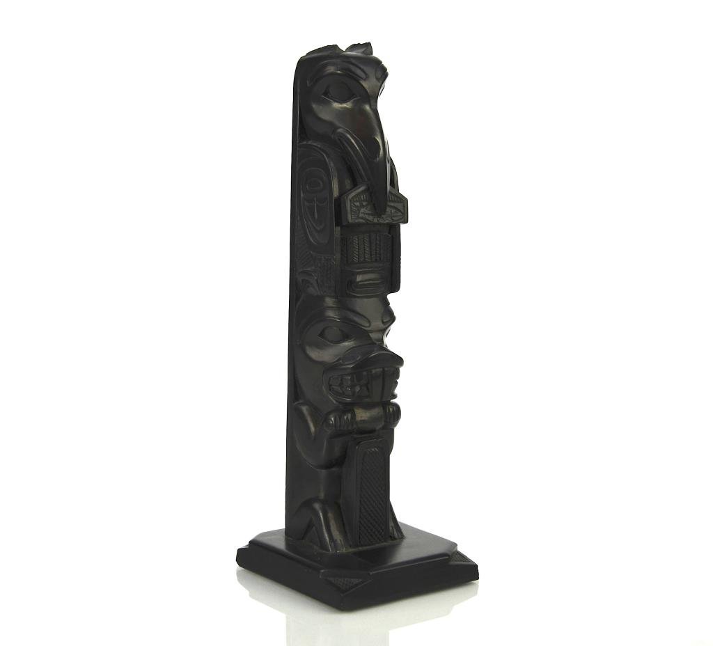 HAIDA CARVED ARGILLITE TOTEM POLE: Inscribed signature to base. H. 19 cm (7 1/2 in.)