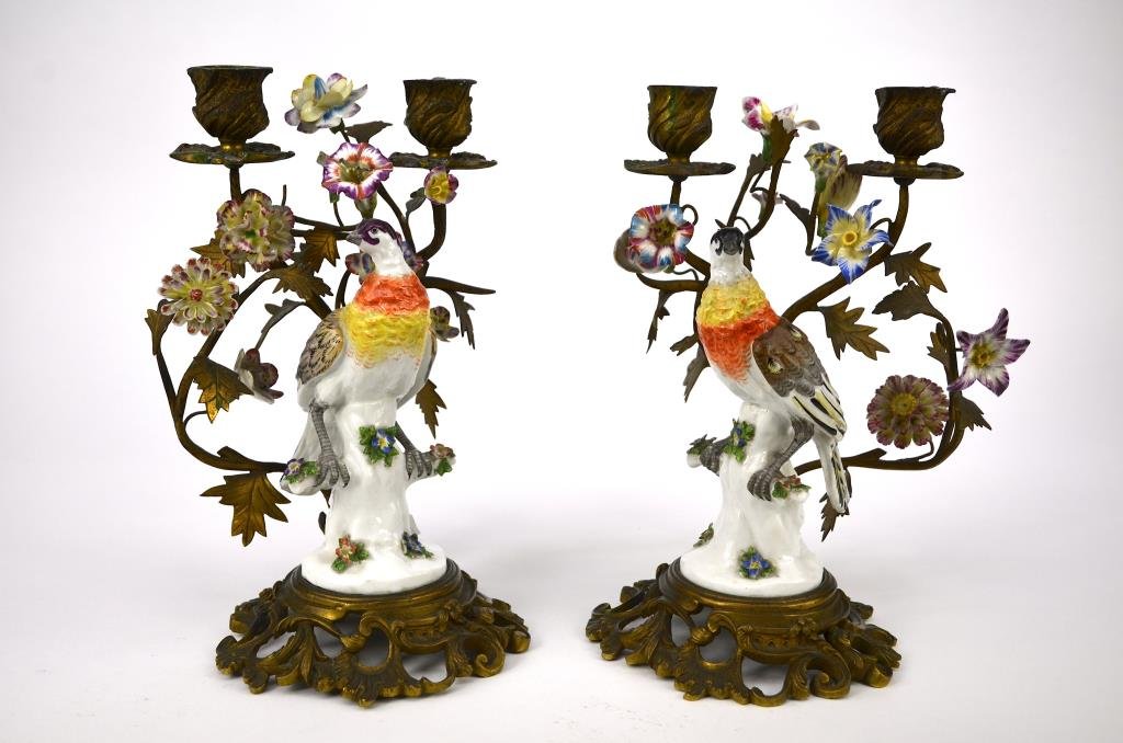 PAIR OF FRENCH PORCELAIN & BRONZE CANDELABRA: Hand painted perched birds with floral incrustations mounted on a bronze base with two candelabra branches, cross swords mark to base for Bourdois & Achille Bloch, 19th C. H 26.5 cm. (10 1/2 in.)