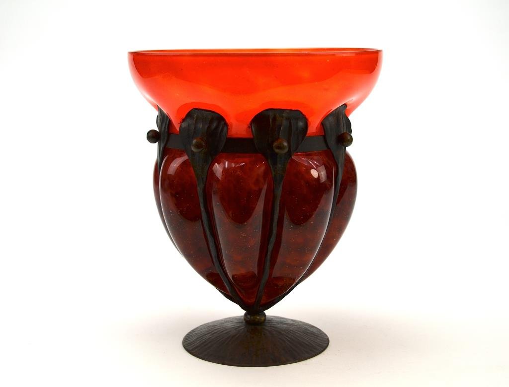 SCHNEIDER RED ART GLASS AND HAMMERED METAL VASE: Red and purple mottled art glass vase fitted in a hammered patinated copper finish metal frame, etched Schneider signature, metal works possibly by Louis Majorelle H.21 cm. (8 1/4 in.)