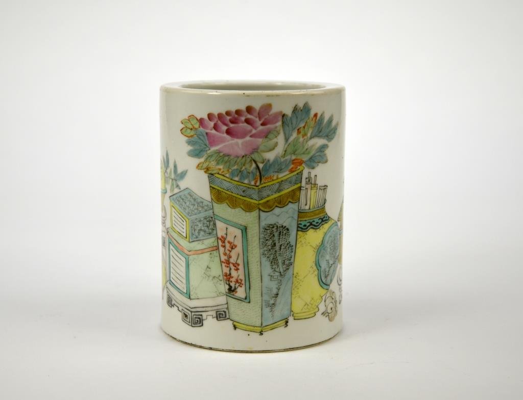 CHINESE FAMILLE ROSE PORCELAIN BRUSH POT: Painted with peony and scholarly objects, complimented with poem in calligraphy signed as Xu Changheng with artist seal, Daoguan mark to base. Late Qing/early Republican. H. 13cm (5 1/8 in.) Good cond