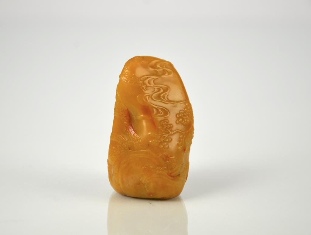 CHINESE CARVED YELLOW SOAPSTONE SEAL: Light creamy yellow stone finely carved a continuous riverside scene with scholars, possibly tianhuang stone. H. 6cm (2 3/8 in.) In good condition with no chip. Seal face reads ôSuyang yinö (Suyang