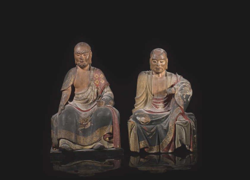 PAIR OF JAPANESE CARVED WOOD AND LACQUER FIGURES: Two Rakan Arahant seated figures with gilt polychrome lacquered details. Edo period. H. 37cm (14.5 in.)