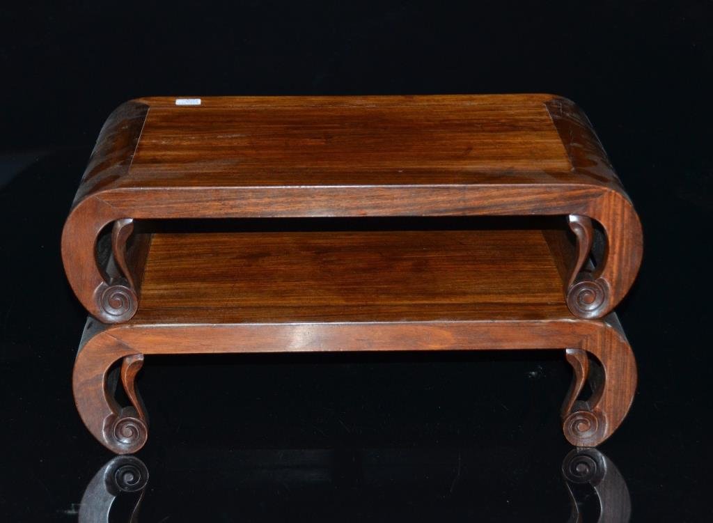 PAIR OF CHINESE HARDWOOD FOOTSTOOLS: Kang form with turned and pierced feet, good patination to underside of tables. L 53 cm. (20 3/4 in.)