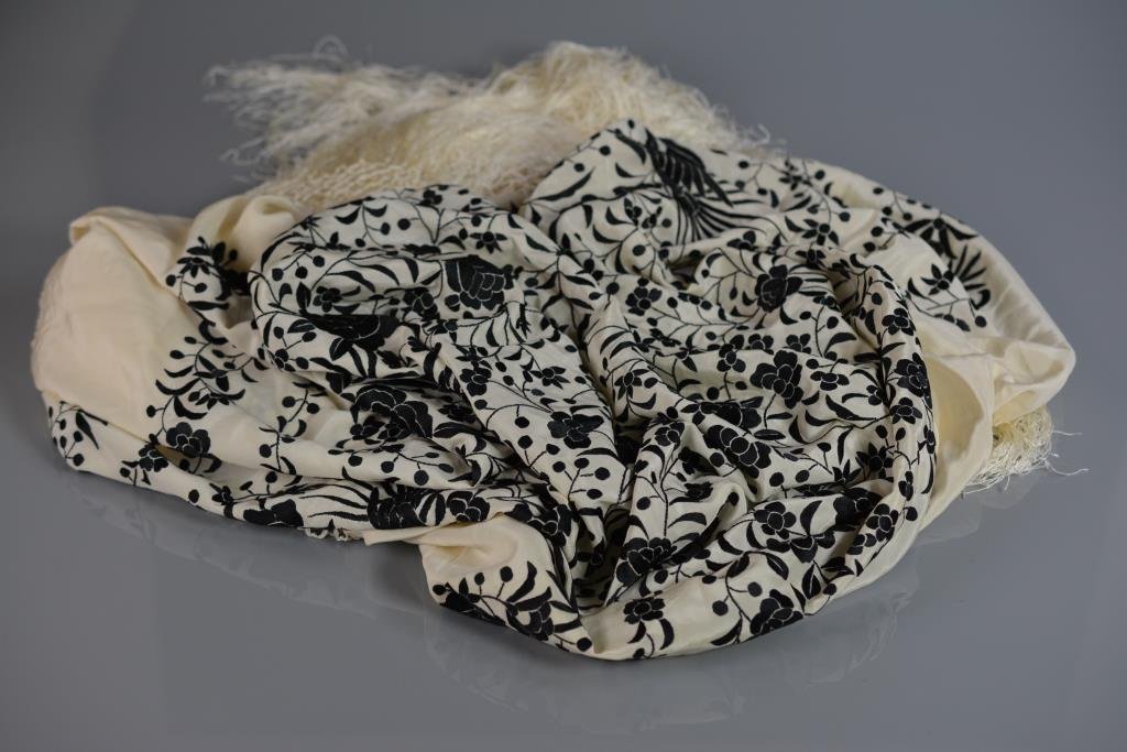 CREAM AND BLACK EMBROIDERED SILK PIANO SHAWL: With peonies and birds, Chinese, early 20th c.