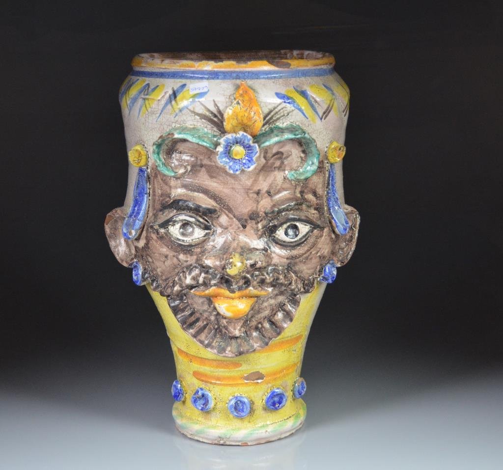 MAJOLICA FAIENCE VASE W BLACKAMOOR FACE: polychrome to the front, cream coloured glaze to back and interior. Probably 19th century. H 42 cm (16.5")