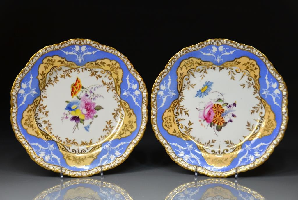 PAIR OF 19TH C ENGLISH PORCELAIN CABINET PLATES: Possibly Spode with peach and periwinkle blue ground and hand painted floral bouquet. Dia 23.5 cm. (9 1/4 in.)