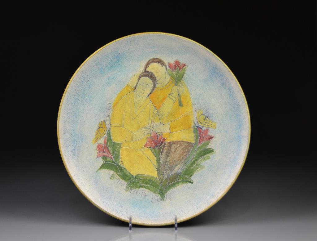 THEO & SUSAN HARLANDER BROOKLIN POTTERY PLAQUE: Decorated with an embracing couple between birds,. titled Eva & Thom and dated September 14, 1973, impressed marks to reverse. Dia 28 cm (11 in.)