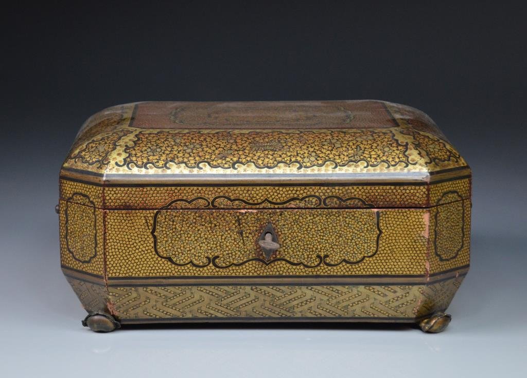 CHINESE EXPORT LACQUER & GILT SEWING CASKET: Exterior of ornate foliate gilt decoration, interior finely fitted with trays and ivory inserts, 19th C. W28 cm. (11 in.)