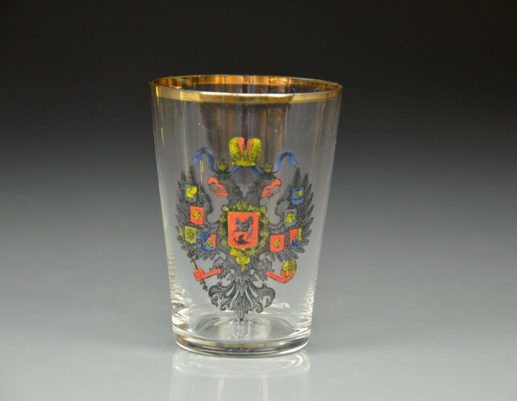 RUSSIAN IMPERIAL GLASS BEAKER: With the Hapsburg double eagle crest and gilt trim. H 8 cm. (3 1/4 in.)