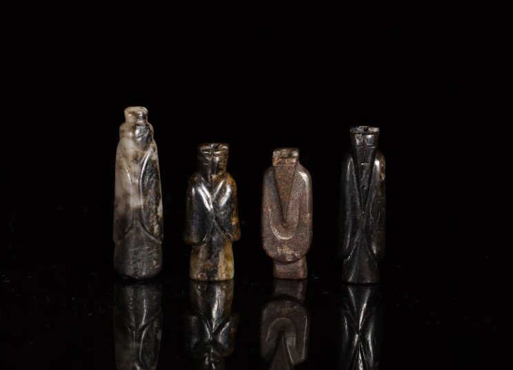 FOUR EARLY CHINESE JADE FIGURAL BEADS (1 of 1)