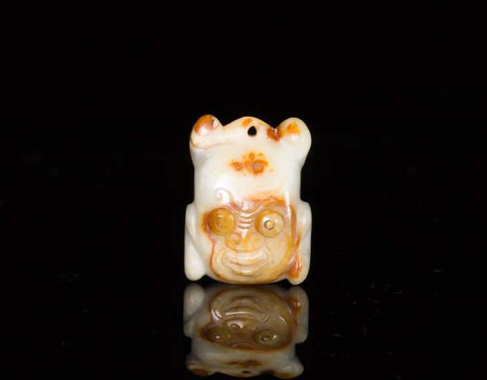 CHINESE RUSSET & CELADON JADE MASK FIGURAL PENDANT (1 of 1)