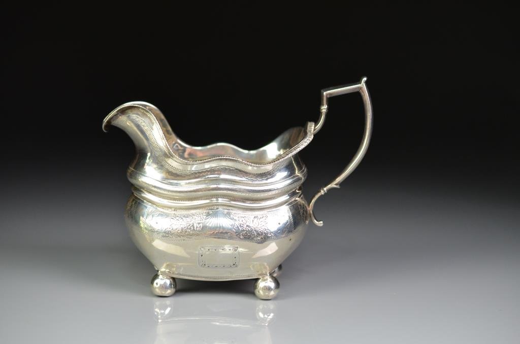 GEORGE III IRISH SILVER CREAM JUG (1 of 5)