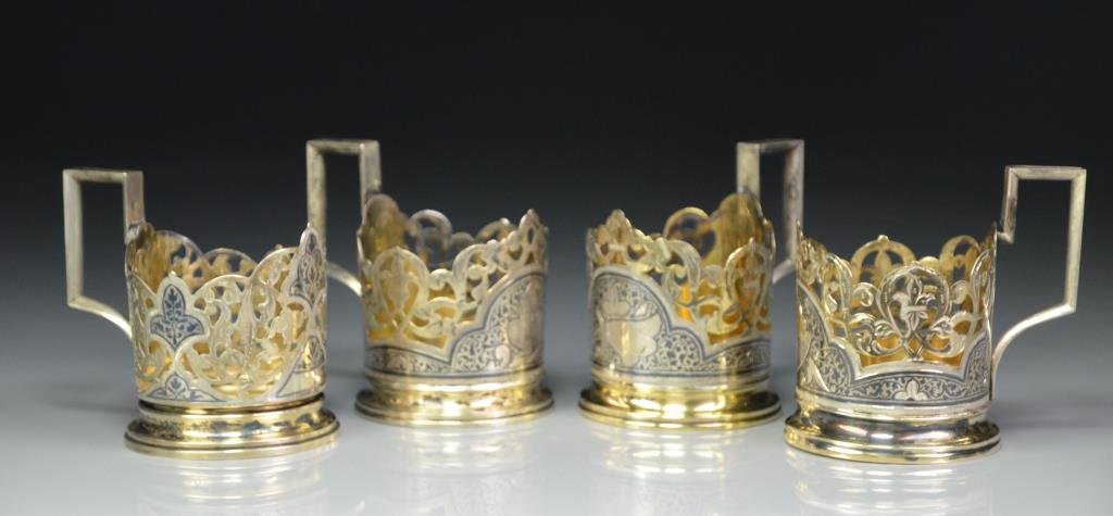 FOUR RUSSIAN SILVER GILT NIELLO TEA GLASS HOLDERS (1 of 1)