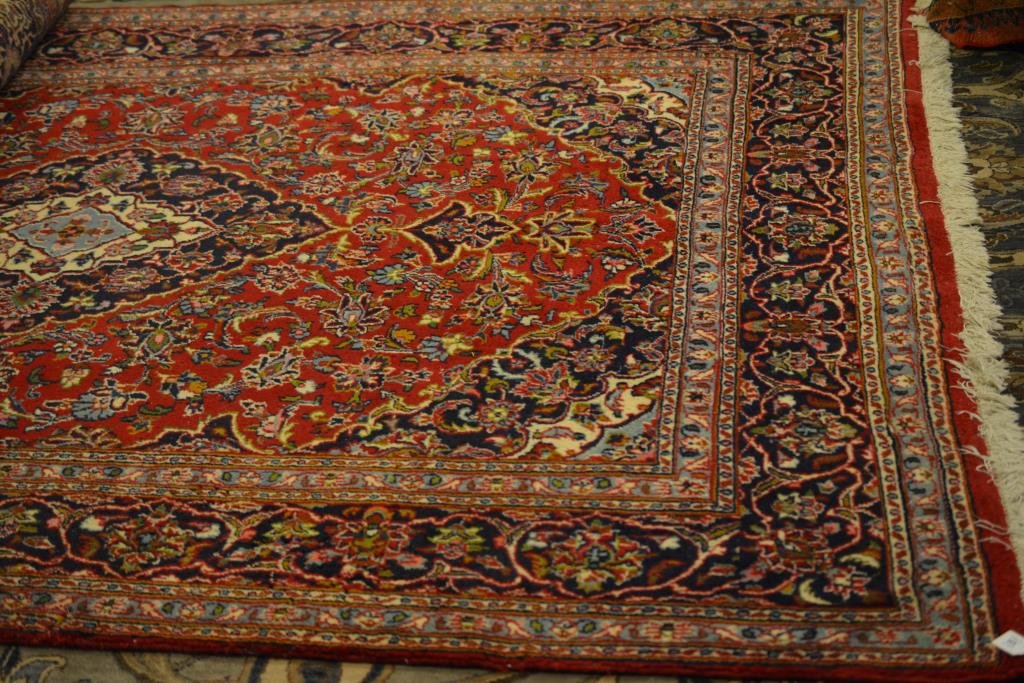 RED GROUND PERSIAN WOOL RUG (1 of 3)