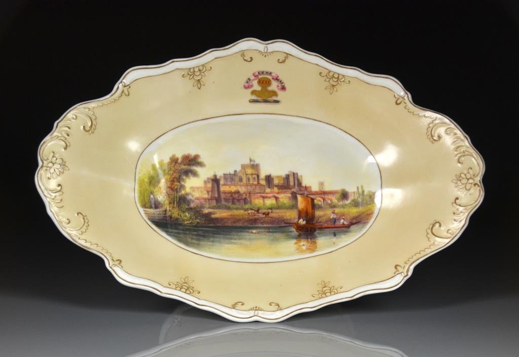 19th C ENGLISH PORCELAIN BOAT SHAPED TUREEN: Peach glazed body with a central hand painted scene of the Windsor Castle. Crested Ne Cede Malis. Spode. W 35.5 cm. (14 in.)