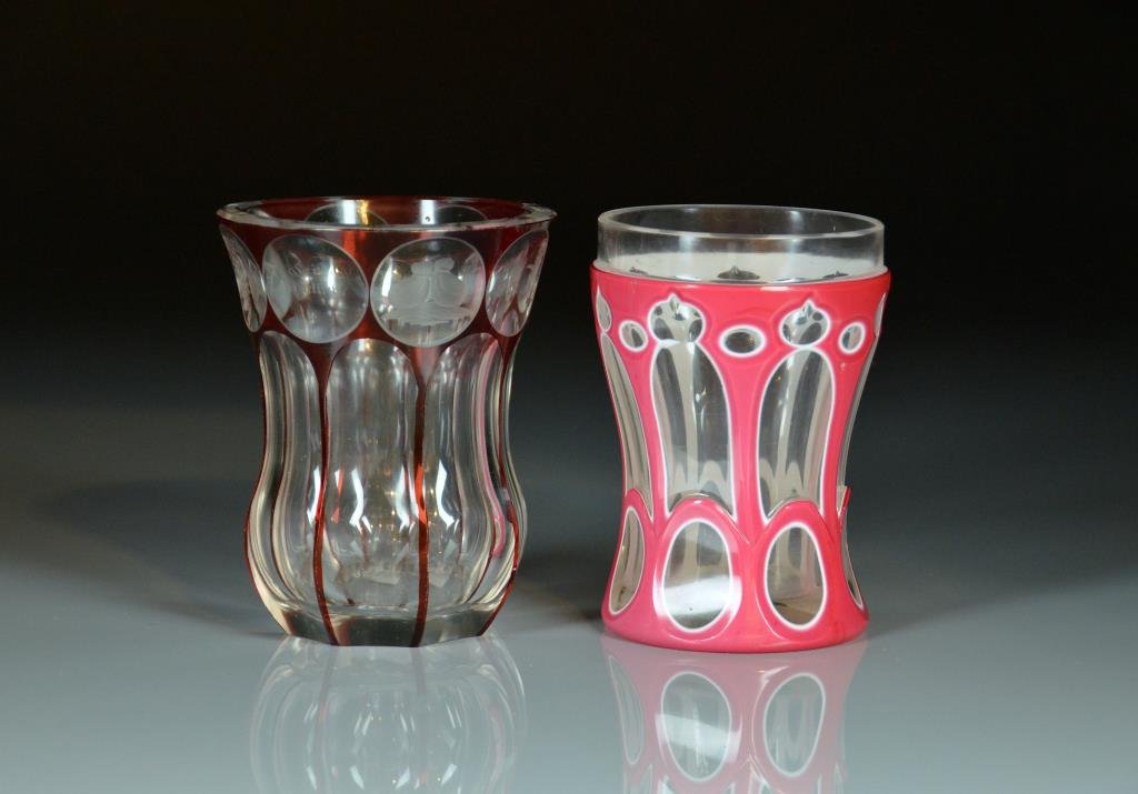 TWO BOHEMIAN CUT CLASS TUMBLERS: One pink bohemian cased enamel cut glass tumbler, with red bohemian flash glass tumbler with German sayings and pictures. H: 4 1/4 in (11 cm); D: 3 1/2 in. (9 cm)