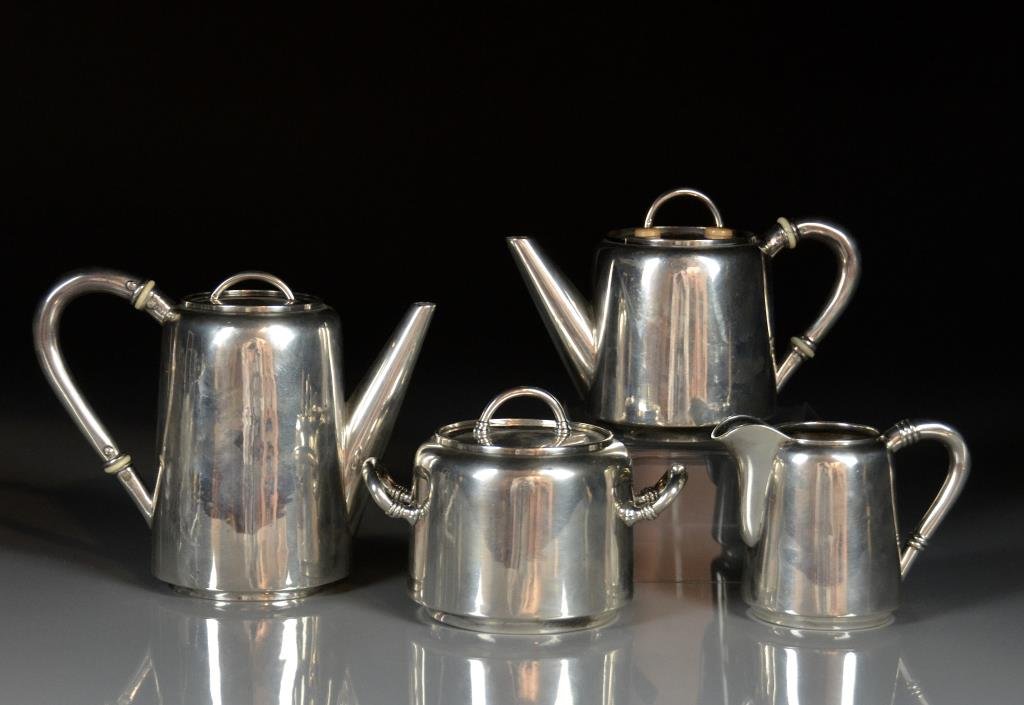 A RUSSIAN FOUR PIECE SILVER TEA & COFFEE SET (1 of 6)
