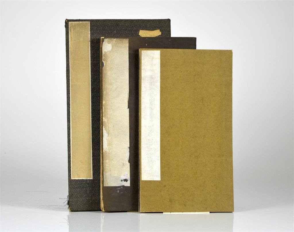 THREE RUBBING ALBUMS OF THE 'XIAO GUAN' STELE: All accordion albums, one with cloth board cover, two with paper covers. The first with 42 pages of ink rubbing. The second with 31 pages of ink rubbing. The third with 27 pages of ink rubbing. Larges