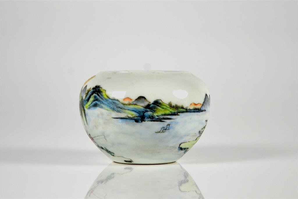 CHINESE FAMILLE ROSE PORCELAIN BRUSH WASHER: Hand painted with a mountainess landscape surrounding a palace, red painted Qianlong mark to base, Republican period. Dia 13 cm. (5 in.)