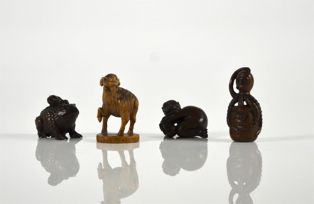 THREE WOODEN NETSUKES AND ONE WOODEN OKIMONO (1 of 2)