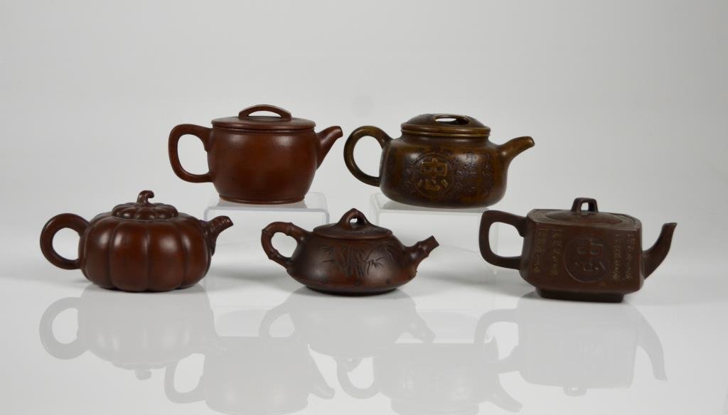 FIVE YIXING POTTERY TEAPOTS (1 of 2)