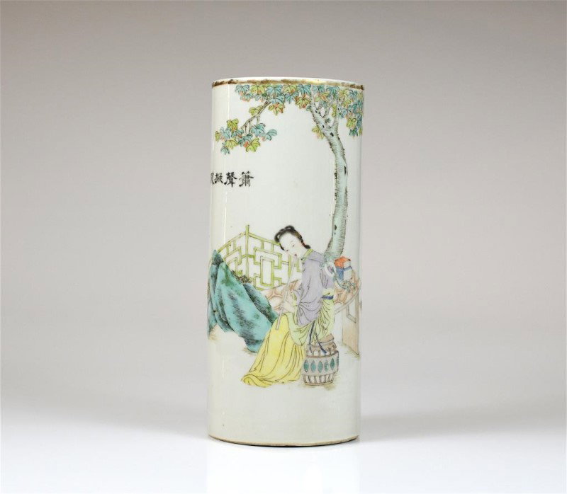 CHINESE FAMILLE ROSE MAO TONG HAT STAND: Of an attendant playing music in the garden, with calligraphy poetic inscription with four character: guan yao nei zhao mark to base. Early 20th C. H: 28.5cm (11 1/4 in.)