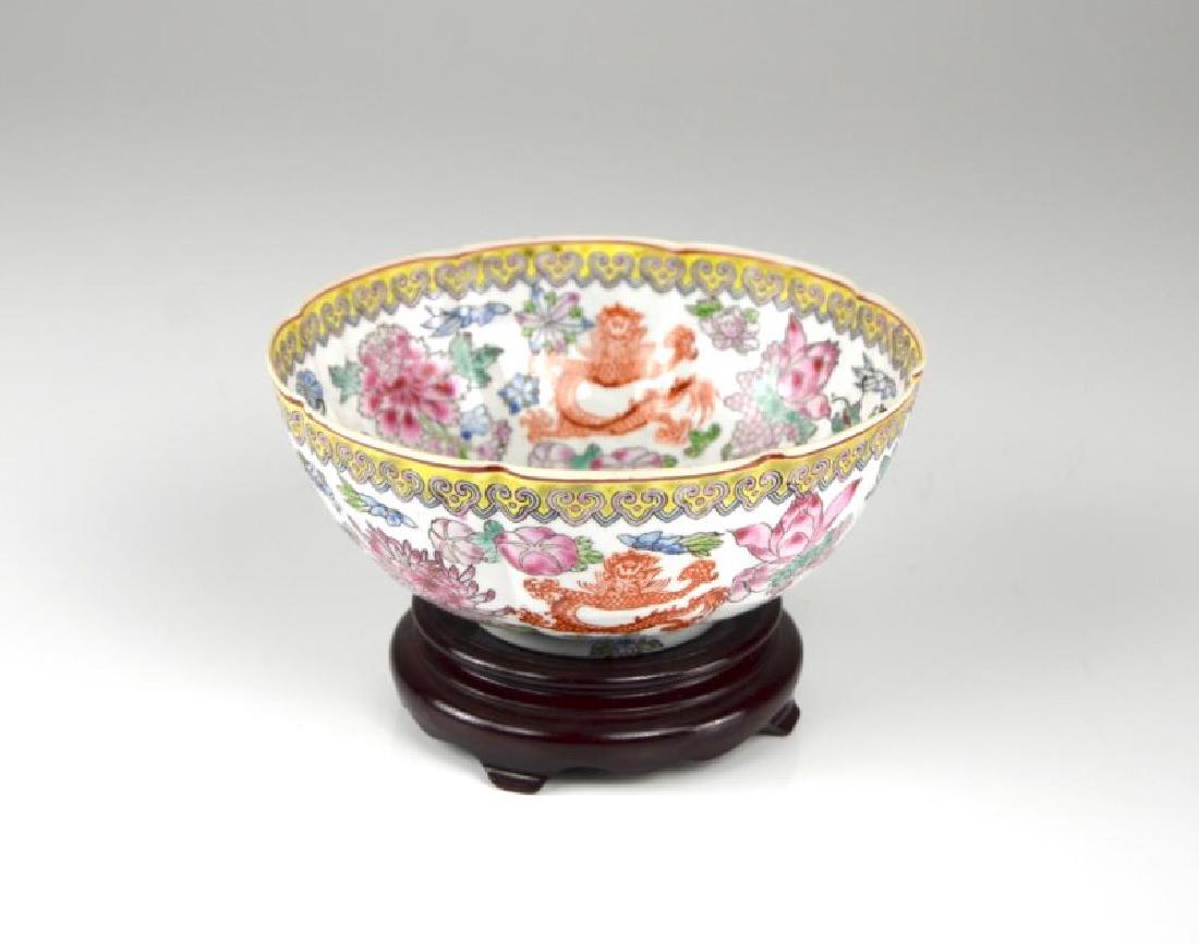 ENAMEL PAINTED EGGSHELL PORCELAIN BOWL: Body shaped in petal form, painted with dragons and florals with wave and ruyi borders. Dia. 16.5cm (6 1/2 in.)