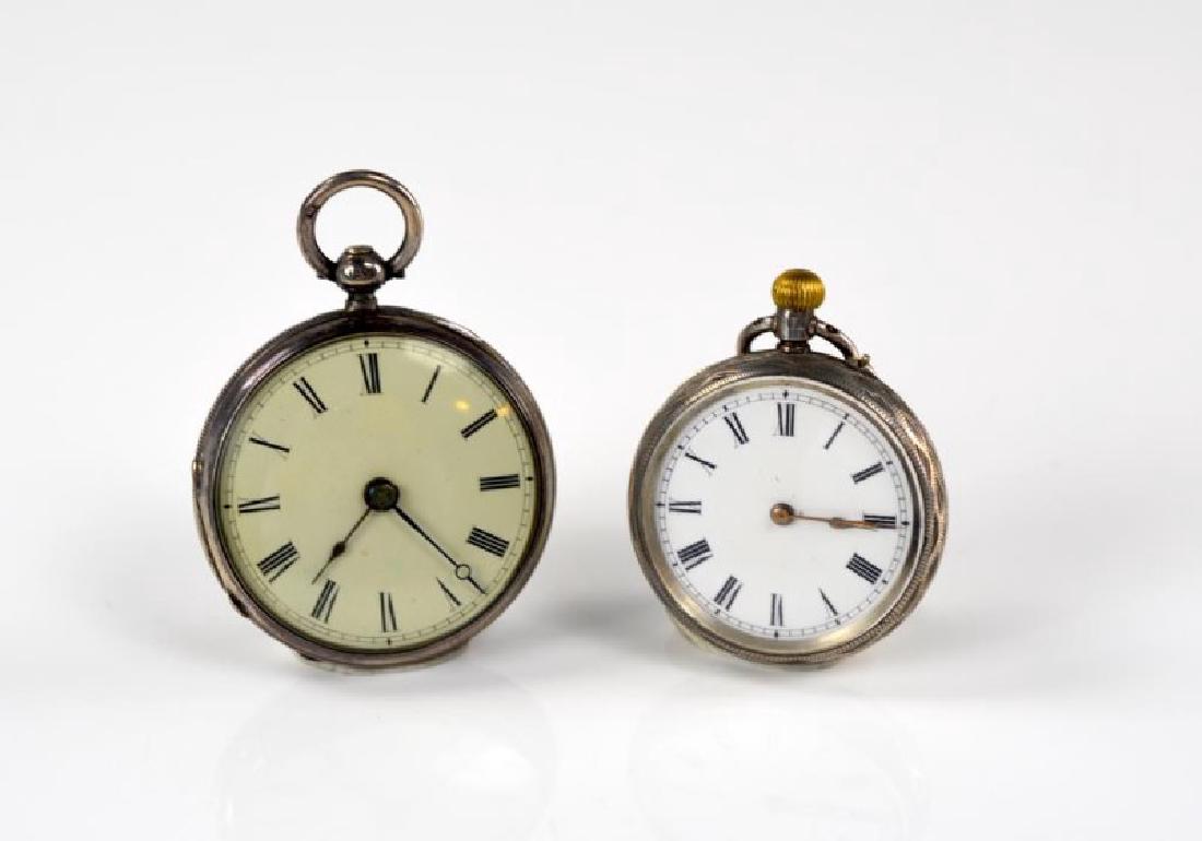 TWO SILVER POCKET WATCHES (1 of 4)