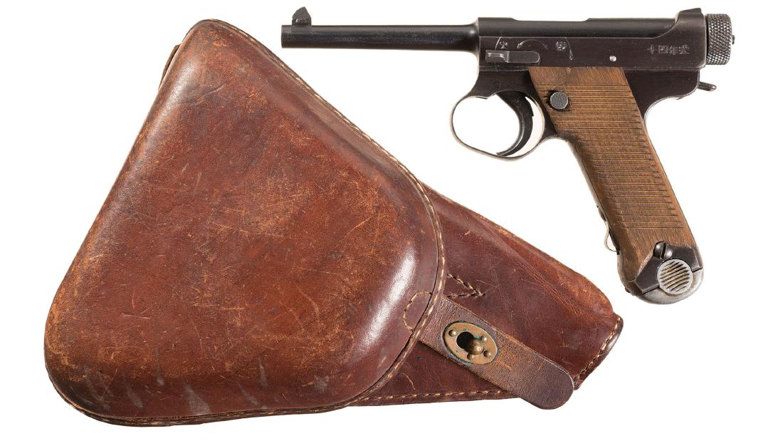 Japanese Nagoya Arsenal Type 14 Nambu Pistol: World War II Japanese Nagoya Arsenal Type 14 Nambu Semi-Automatic Pistol with Holster Rig Dated February, 1944 "19.2". With leather holster, extra magazine, rod, and straps. Manufacturer: Japanese Mod