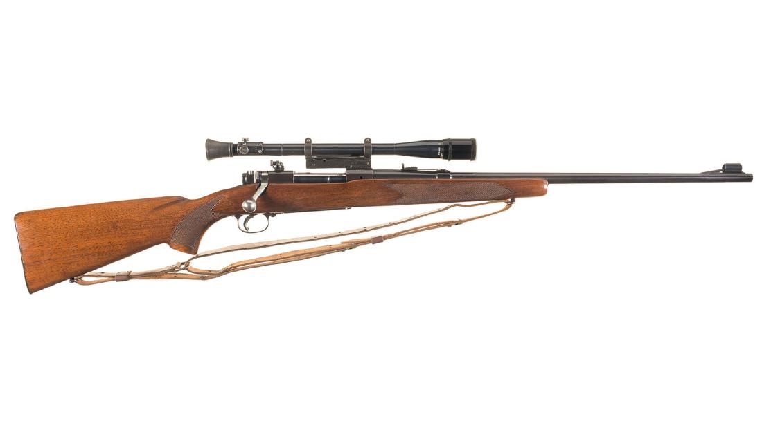 Winchester Model 70 Bolt Action Rifle: Pre-64 Winchester Model 70 Bolt Action Rifle with Scope Manufactured in 1949. With Weaver Model 330 scope. Manufacturer: Winchester Model: 70 BBL: 24 inch round Stock: walnut Gauge: 22 hornet Finish: