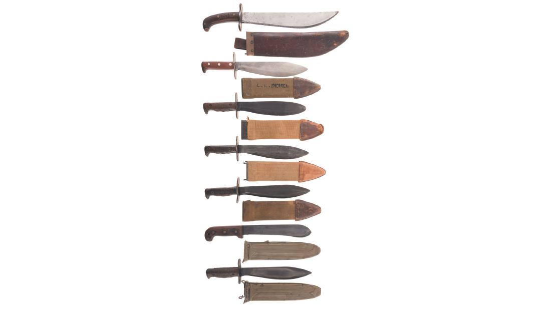 Seven American Bolo/Hewer Style Knives with Sheaths: Seven American Bolo/Hewer Style Knives with Sheaths Grouping includes a short Case-XX hewer with a metal Plumb bolo sheath, four U.S. Plumb Model 1917 bolo knives with sheaths (three canvas/leather, o