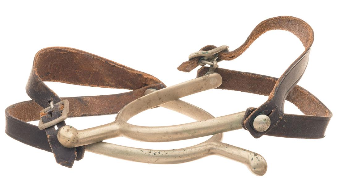 Two Pairs of U.S. Cavalry Spurs with Leather Straps: Four Pairs of U.S. Cavalry Spurs, Including August Buermann and Rock Island Arsenal 1) U.S. and August Buermann marked WWI pattern spurs with U.S. marked leather straps. Overall very good. 2) Rock Isl