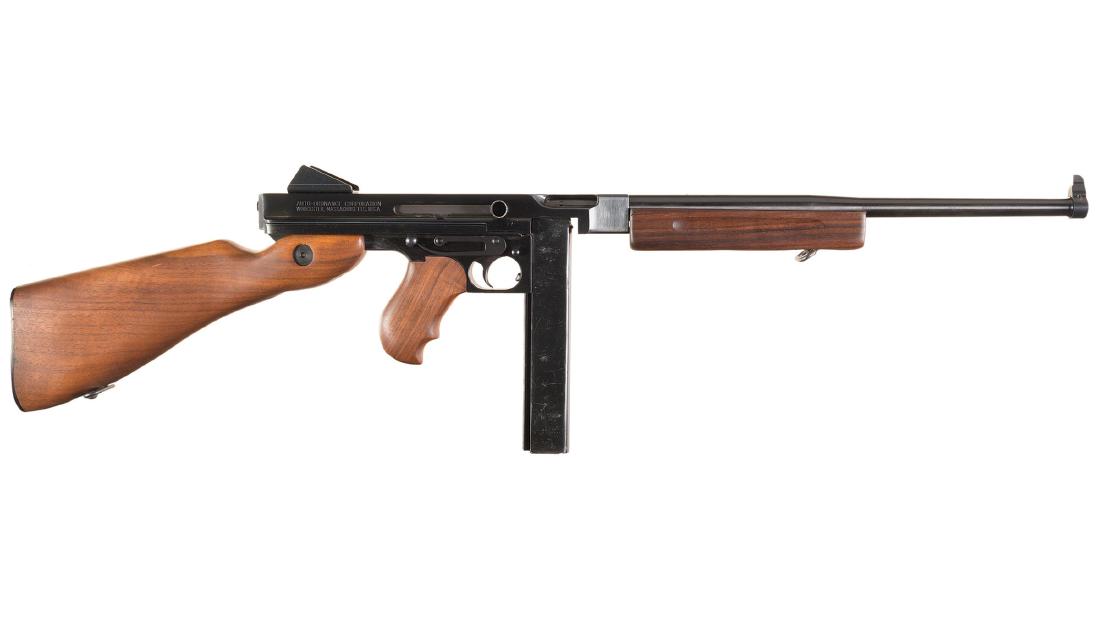 Auto-Ordnance M1 Thompson Semi-Automatic Carbine: Auto-Ordnance M1 Thompson Semi-Automatic Carbine Manufacturer: Auto Ordnance Corp Model: Thompson M1A1 BBL: 16 inch round Stock: walnut Gauge: 45 ACP Finish: blue Grips: Serial Number: KC2734 Class: M