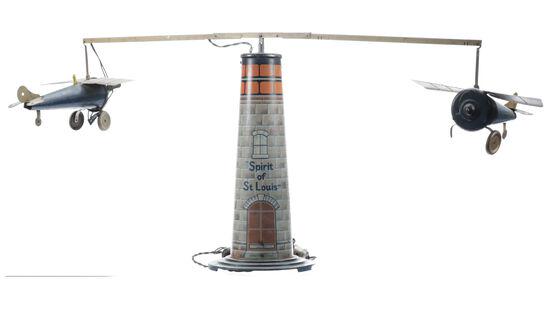 Rare "Spirit of St. Louis" Electric Airplane Toy: Rare "Spirit of St. Louis" Electric Airplane Toy The marking in the title is painted on the tin tower that supports the airplanes of this toy. The tower is 17 inches tall and is painted to resemble a
