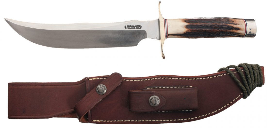 Randall Knife Society Bear Bowie with Sheath: This Randall Knife Society Bear Bowie has an 8 1/2 inch blade marked with the two line Orlando address and the number "RKS 891". It has a stag handle with butt cap. OAL: 13 1/8 inches. Comes with a br
