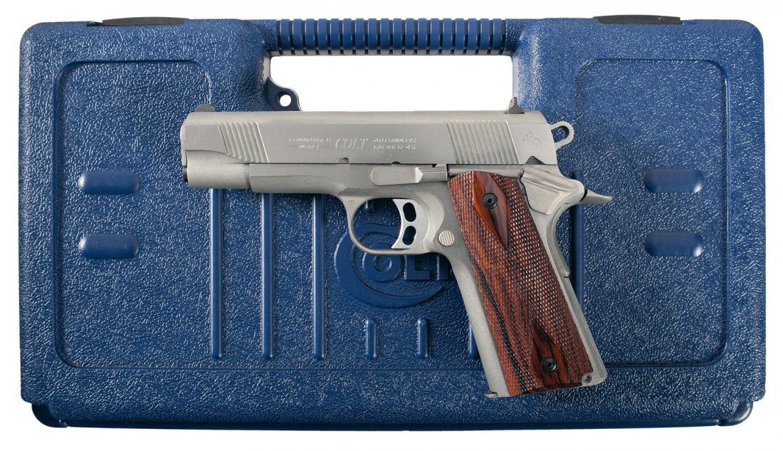 Colt Combat Commander Semi-Automatic Pistol with: Fixed three dot sights, combat style hammer, adjustable trigger, and double diamond checkered grips. Complete with original blue Colt hard case, cable lock, and manuals. BBL: 4 1/4 inch round Stock: G