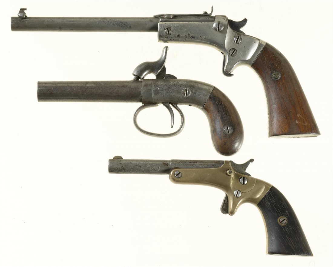 Three Single Shot Pistols -A) Stevens Tip Up Pistol: Three Single Shot Pistols -A) Stevens Tip Up Pistol Manufacturer: Stevens J Arms Co Model: Tip Up BBL: 6 inch part octagon Stock: Gauge: 22 Finish: blue/nickel Grips: walnut Serial Number: 21098 Class