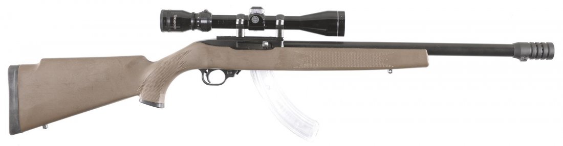 Ruger Model 10/22 Semi-Automatic Carbine with Scope: Ruger Model 10/22 Semi-Automatic Carbine with Scope With Tasco 3-9X40 scope. Manufactured in 1972. Manufacturer: Ruger Model: 10 22 BBL: 17 3/4 inch round Stock: synthetic Gauge: 22 LR Finish: blue Gr