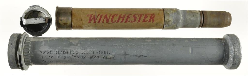 Winchester Dummy Artillery Shell with Original Aluminum: Winchester Dummy Artillery Shell with Original Aluminum Case Manufactured just after WWII. 29 1/12 inches tall. Nose piece absent. Manufacturer: None Model: None BBL: Stock: Gauge: Finish: Grips: Se