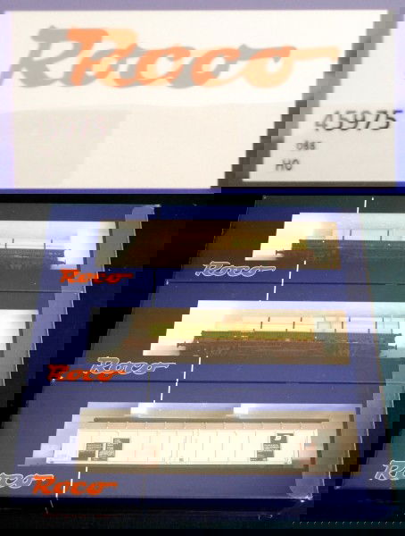 3 OBB Goods Cars Roco HO Scale Factory Set: 3 OBB Goods Cars Roco HO Scale Factory Set. The Austrian models are in the original boxes and packing. This is a factory 3 pack from Roco. We see that the models all feature European Couplers. We see