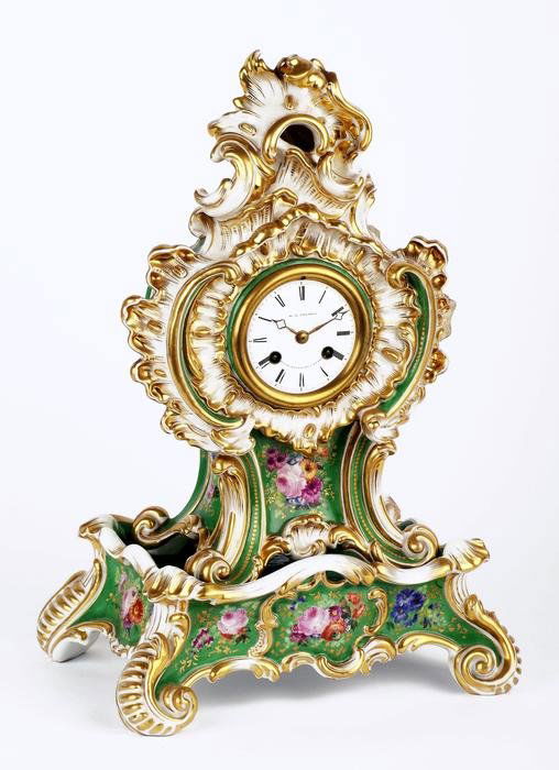 A French Jacob Petit porcelain cased mantel clock: A French Jacob Petit Paris porcelain cased mantel clock, late 19th century, the eight-day bell striking movement with white enamel Roman numeral dial signed W. B. PROMOLI, RUE DE BOULOGNE 4, A PARIS t