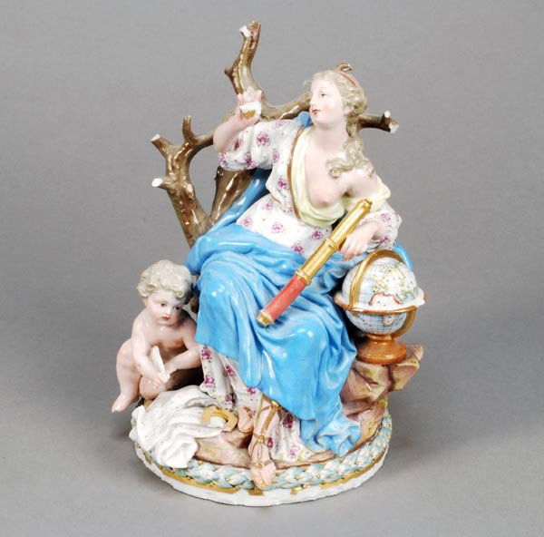 A Meissen group of Urania (Muse of astronomy)with: Signed: A Meissen group of Urania (Muse of astronomy)with putto, modelled seated before a tree withattributes, 19cm high