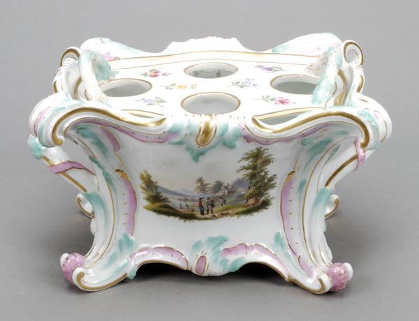 A Meissen bough-pot and pierced liner, modelleden: Signed: A Meissen bough-pot and pierced liner, modelleden rocaille and painted with deutsche Blumen anda vignette of fis