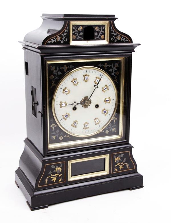 A Blackforest brass and pewter inlaid ebonised â€˜: A Blackforest brass and pewter inlaid ebonised â€˜cuckooâ€™ table clock, Unsigned, mid 19th century. The wooden framed twin fusee outside countwheel gong striking movement with â€˜cuckoo�