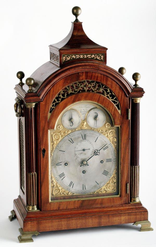 A fine George III brass mounted mahogany quarter c: A fine George III brass mounted mahogany quarter chiming musical table clock, John Taylor, London, circa 1800, The substantial six pillar triple fusee movement chiming the quarters on eight b