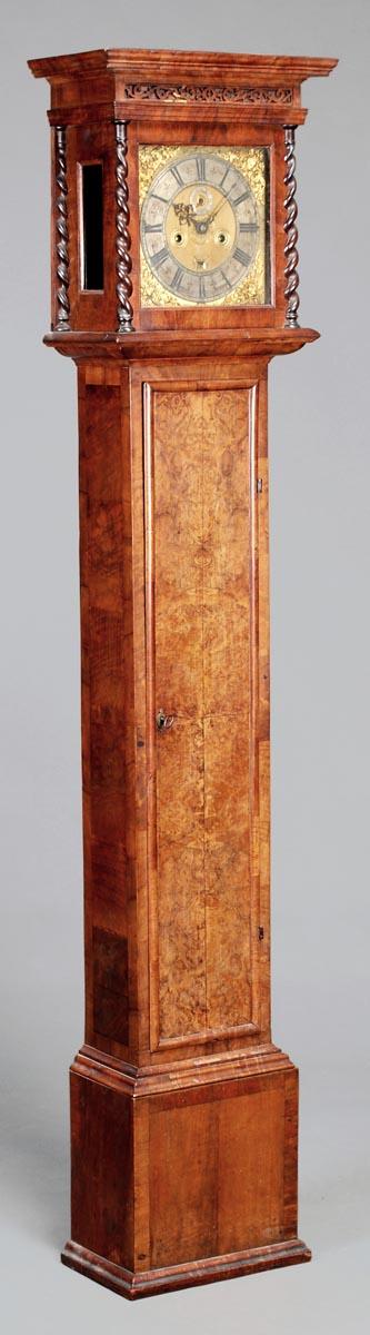 A walnut eight-day longcase clock with ten inch d: A walnut eight-day longcase clock with ten inch dial, Thomas Johnson, Ratcliffe Cross, London, late 17th century. The five finned pillar outside countwheel bell striking movement with ancho