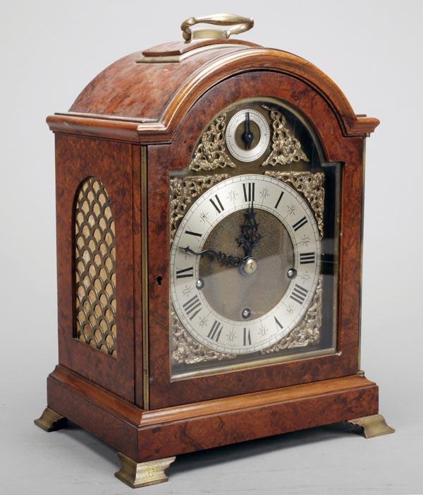 A burr walnut quarter chiming bracket clock, 20th: A burr walnut quarter chiming bracket clock, 20th century, the eight-day movement chiming the quarters on four gongs and with brass break-arch dial signed John Walker 1 Sou. Molton St. W1 wit
